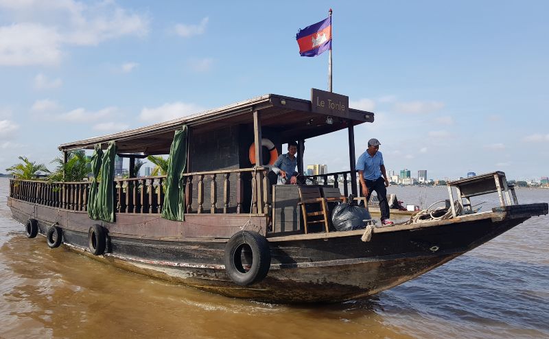 Wooden boat on the Mekong river in Phnom Penh