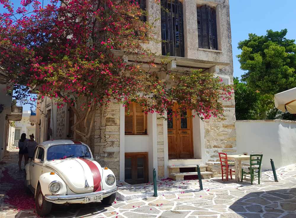 Naxos Greece: Travel Guide 2023 14 Old car and cafe in Halki village, Naxos, Greece