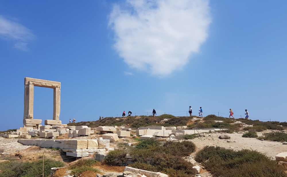 Naxos Greece: Travel Guide 2023 12 Photo of the Portara or marble gate at the entrance to the ruined and incomplete Temple of Apollo, Naxos, Greece