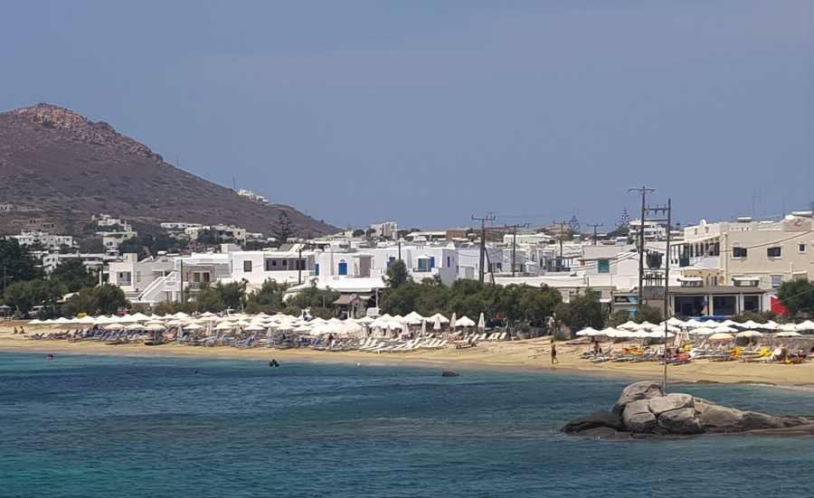 Naxos Greece: Travel Guide 2023 6 A phot of sun loungers on Agios Prokopios Beach, Naxos, Cyclades, Greece